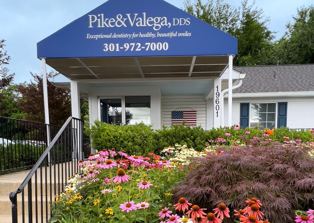 pike-valega-dental-office-exterior Pike and Valega dental office exterior with flowers